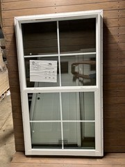 34” X 60” Single Hung Windows Black Exterior.