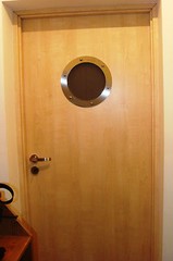 FLAT PORTHOLE FOR DOORS STAINLESS STEEL 230 mm