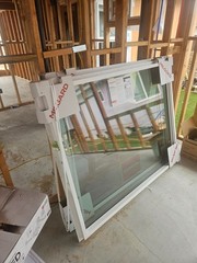 2 vinyl windows, new construction, value $750, will sell for $300