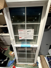 NEW Milgard 63.5″ x 23.5″ slider window—single hung vertical slider with grills