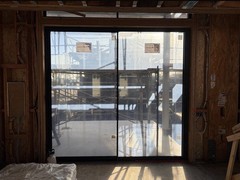 Fleetwood Series 3000 XO Sliding Door Black Aluminum Low-E Glass 128×120 in