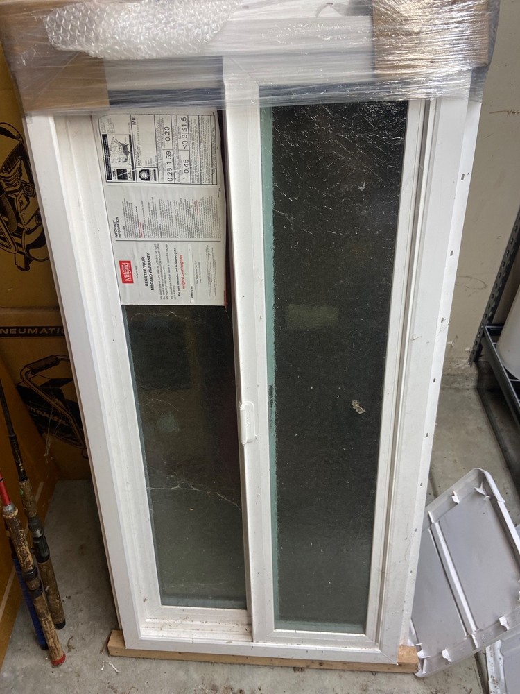 Milgard Vinyl window with retrofit frame