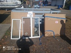 One Gliding Patio Door With Screen And Hardware Also 2 Egress Windows
