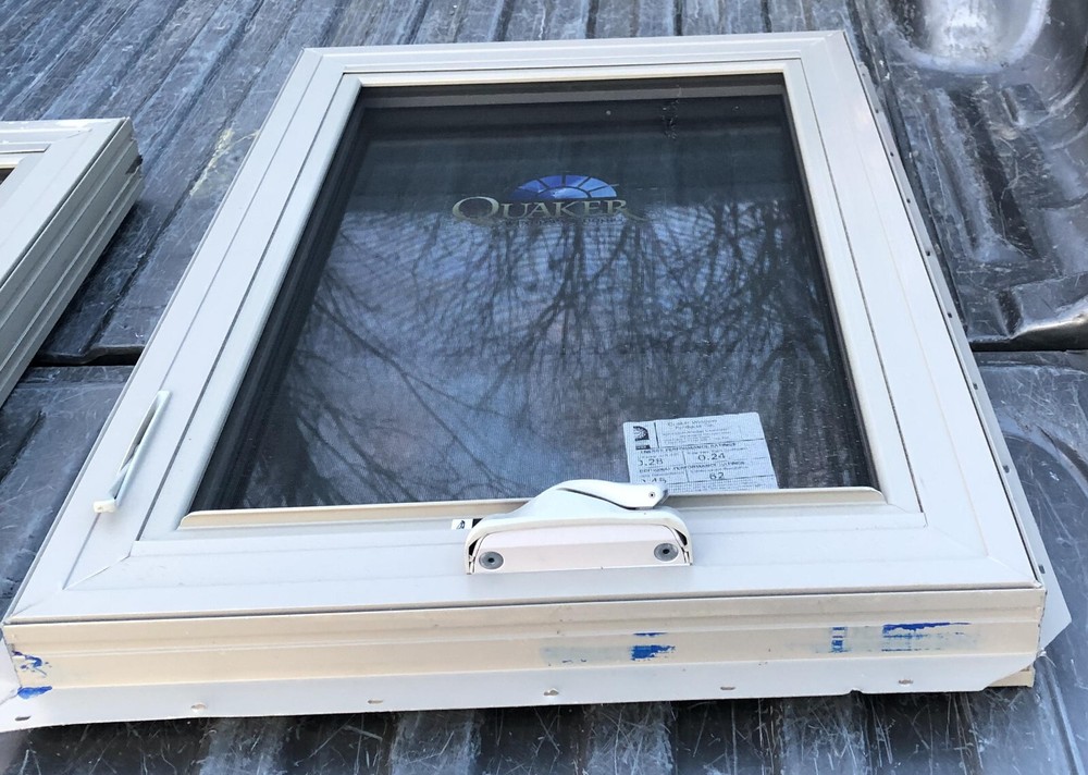 Vinyl Double Pane Casement Window 24” x 36” tan new construction quaker