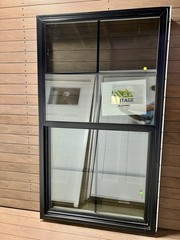 34” X 60” Single Hung Windows Black Exterior.